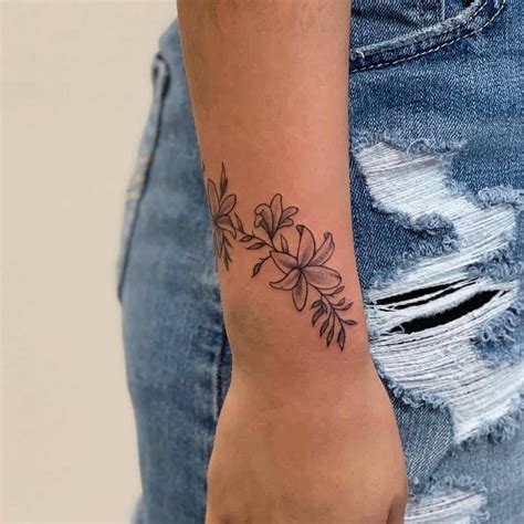 flower tattoo wrist